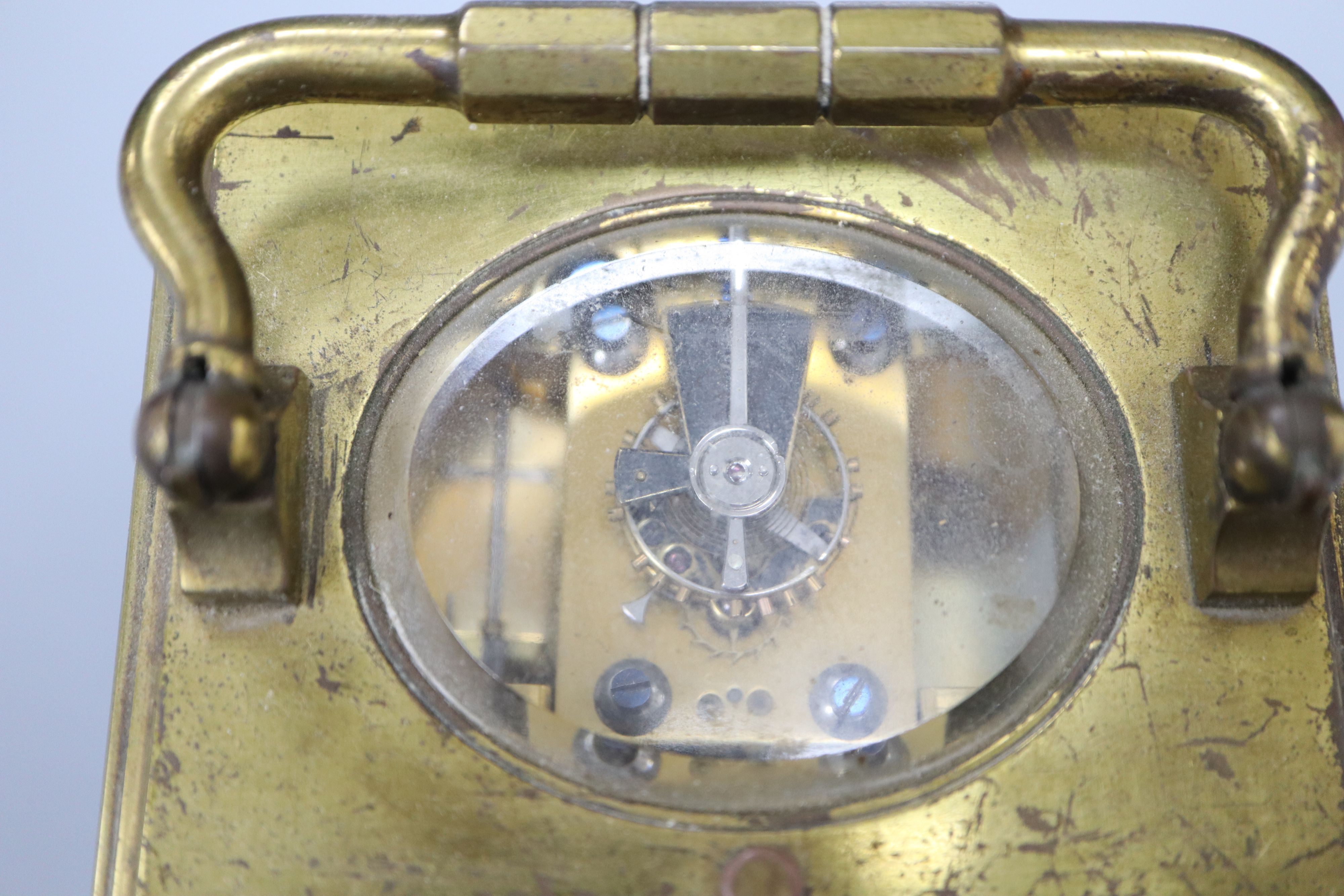 An hour repeating brass carriage clock,14cm